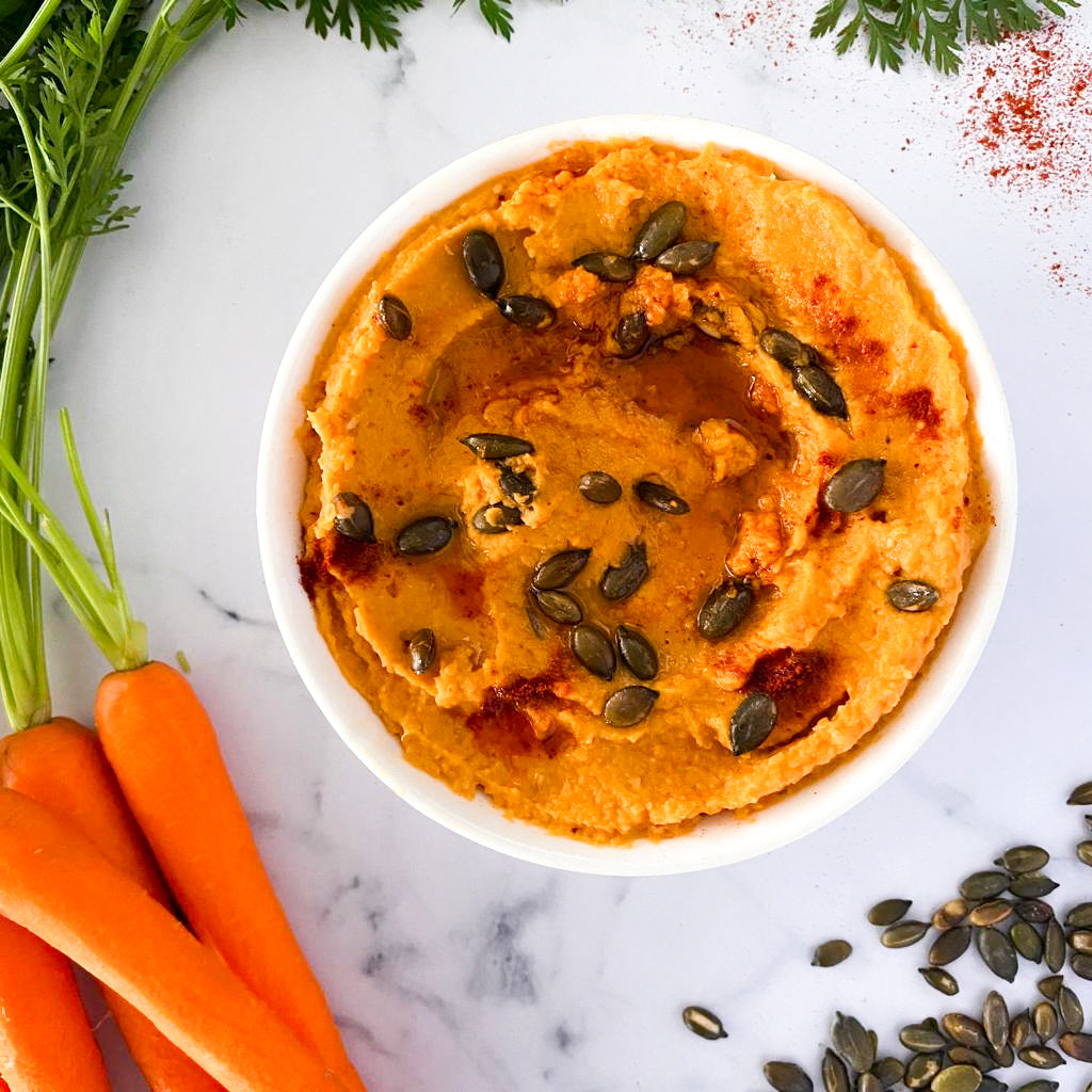 Roasted carrot hummus with garlicinfused olive oil Costabile Brand