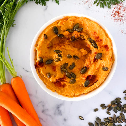 Roasted carrot hummus with garlic-infused olive oil