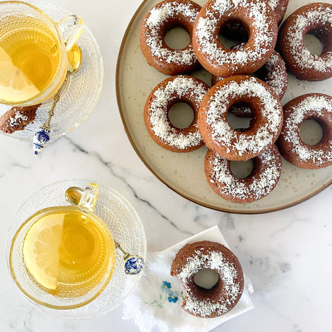 Coconut and chocolate donuts with extra virgin olive oil