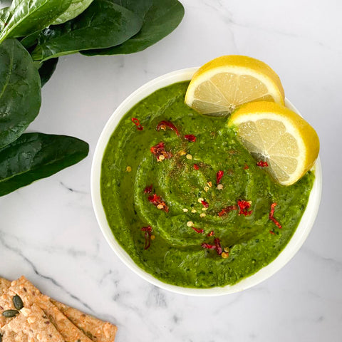 Spinach and lemon hummus with garlic infused olive oil