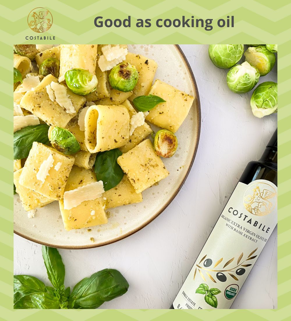 Basil infused olive oil extra virgin from Puglia Italy used as cooking oil with a pasta dish- Costabile