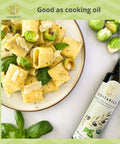 Basil infused olive oil extra virgin from Puglia Italy used as cooking oil with a pasta dish- Costabile