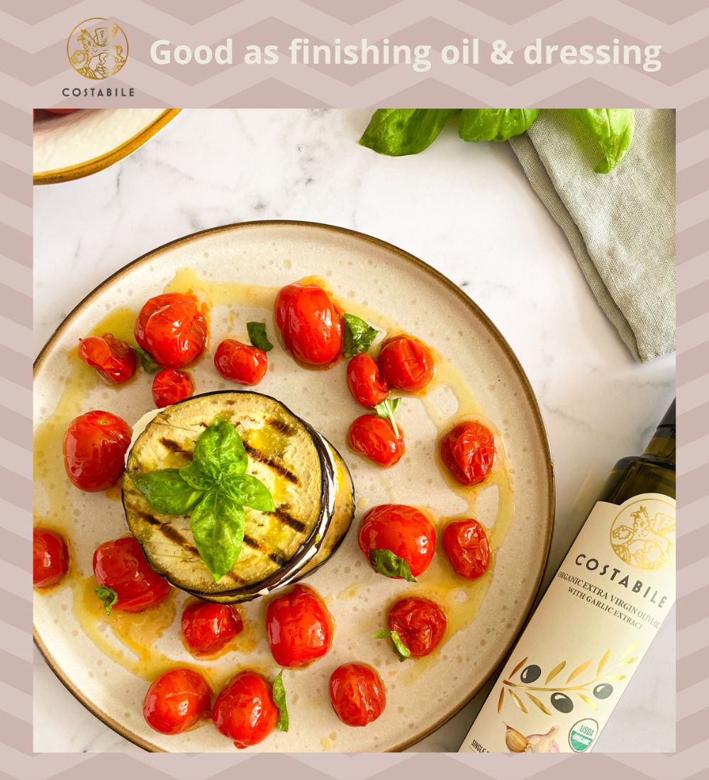 Garlic infused olive oil for dressing a salad made of grilled eggplants, cherry tomatoes and basil -  -  extra virgin organic from Italy - Costabile 8.45 fl. oz 